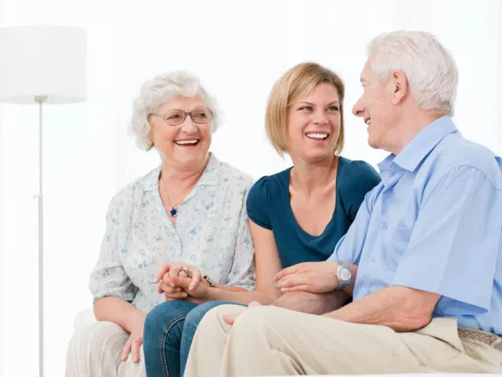 A daughter sits with her elderly parents to navigate their family dynamics and discuss senior living.
