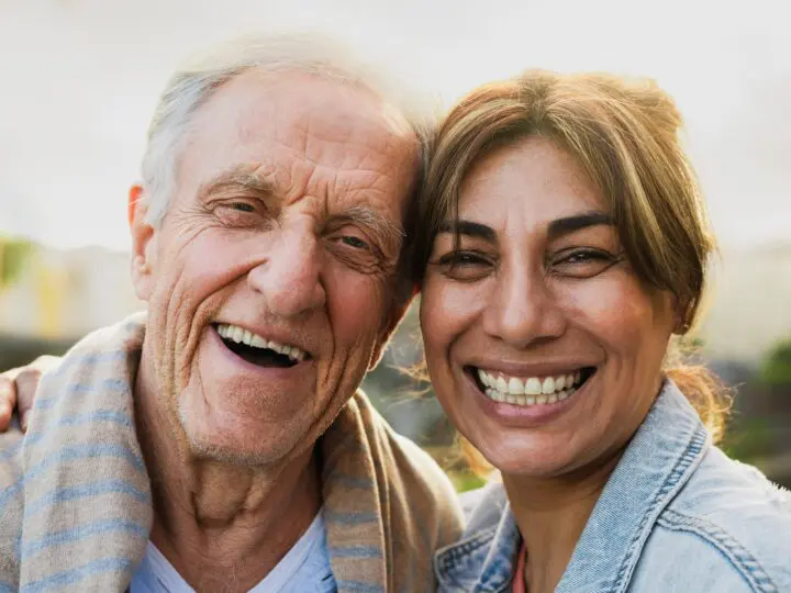 Senior man and woman smiling