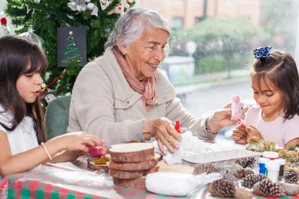 Senior woman doing christmas crafts for seniors