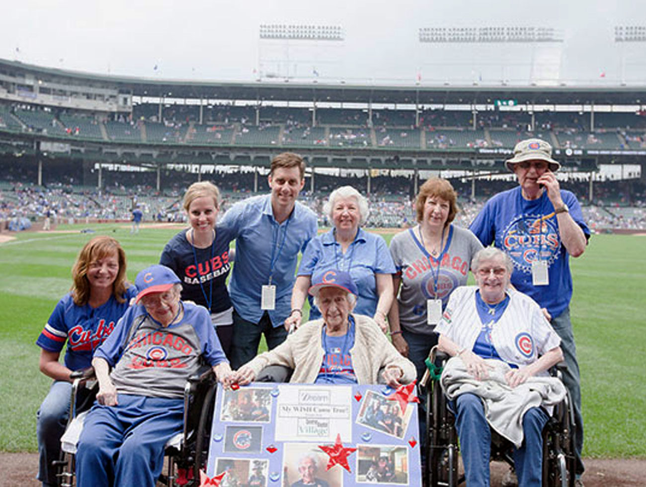 CBV residents joining Louise Sauer at a Cubs game