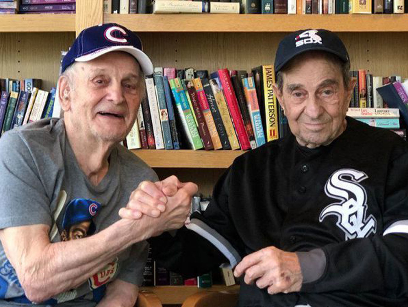 93-year-old Cubs fan and 90-year-old Sox fan at Central Baptist Assisted Living Center