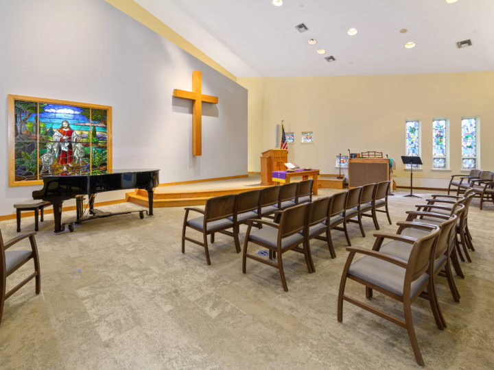 chapel with seating piano cross senior living community