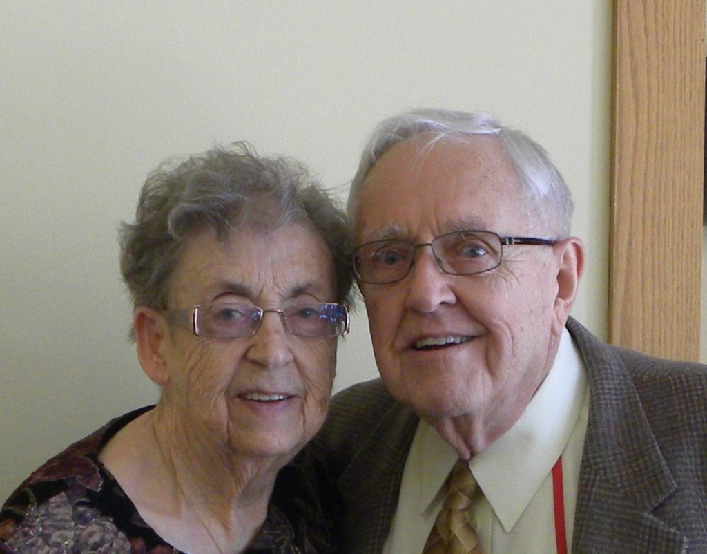 elderly couple smiling together