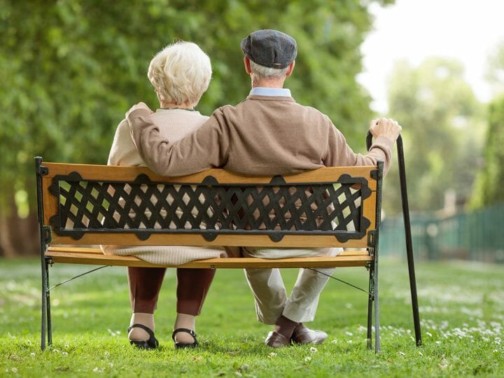 couple sitting together outside with Ambiguous Loss from Dementia