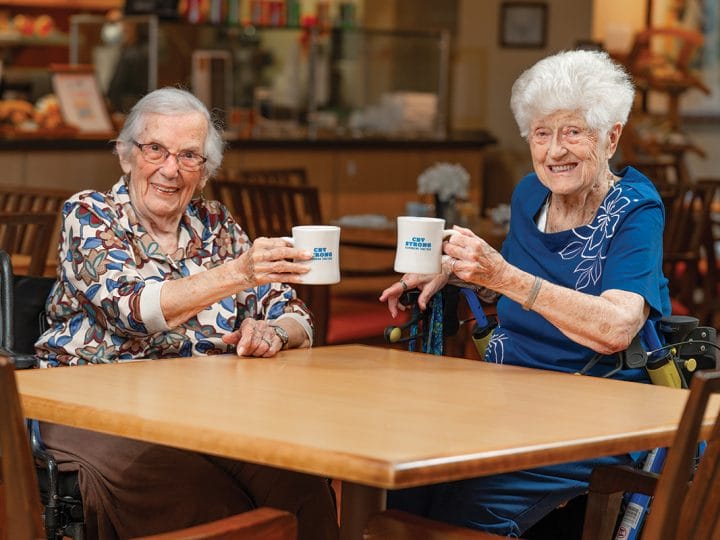Louise and her friend enjoying coffee at CBV where they can still have the independence she wants.