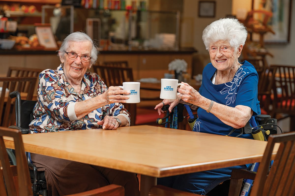 Louise and her friend enjoying coffee at CBV where they can still have the independence she wants.