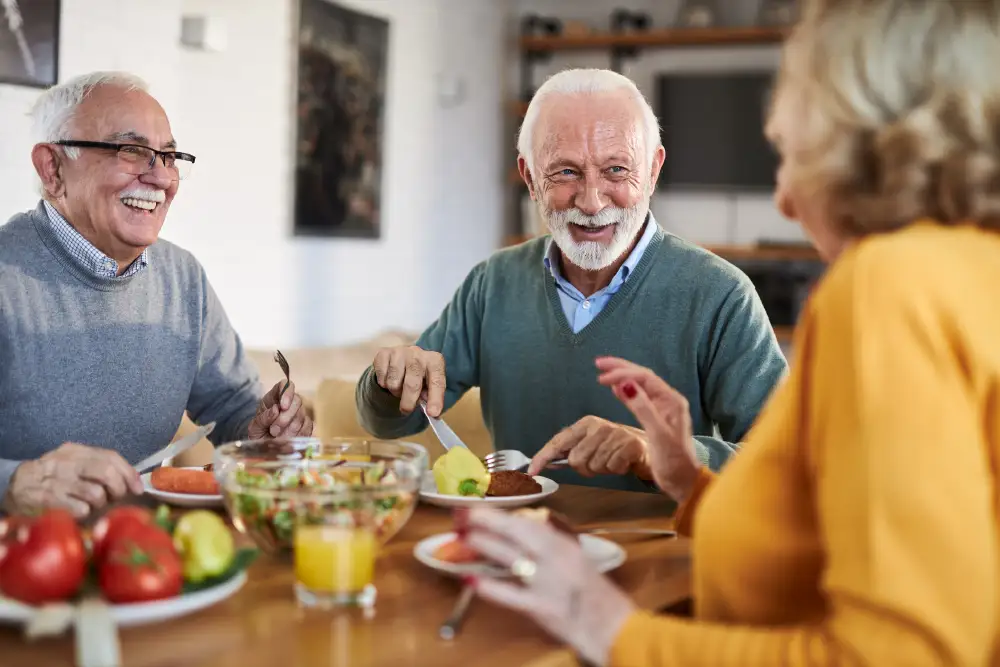 a group of seniors snacking on fruits and vegetables