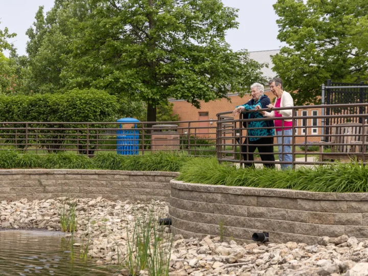 Two residents admiring the outdoor scenery