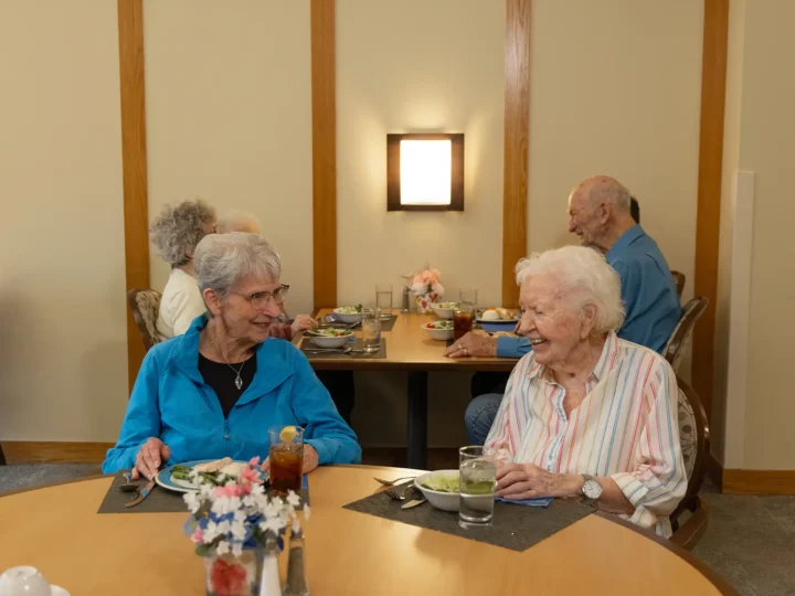 Residents enjoying lunch in the dining room