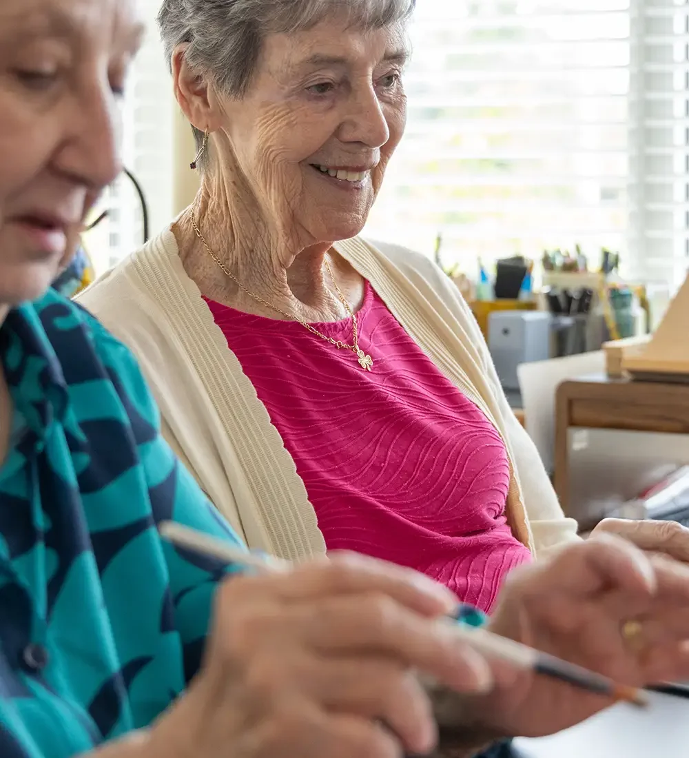 Senoir women painting in the art studio