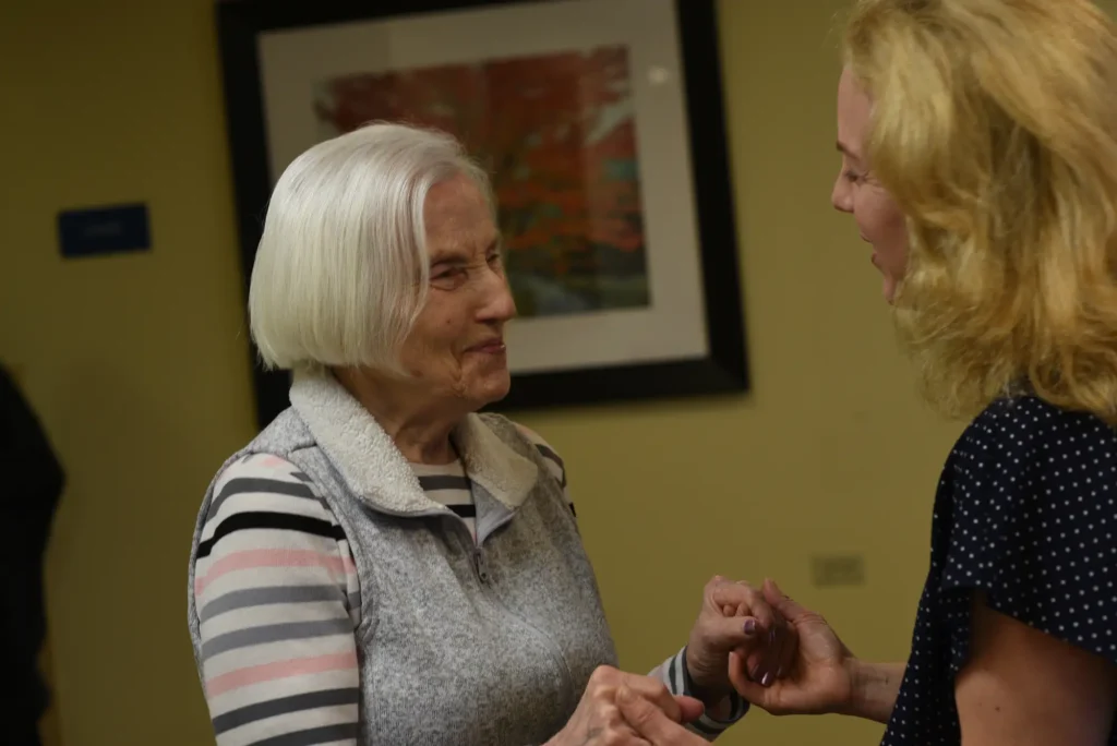 An elderly woman talking with her adult daughter about alternatives to nursing homes at Central Baptist Village in Norridge, IL